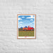 A "From Our Fields to Your Family" poster of a red truck on a brick wall with an artistic design from Shop Wyman's.