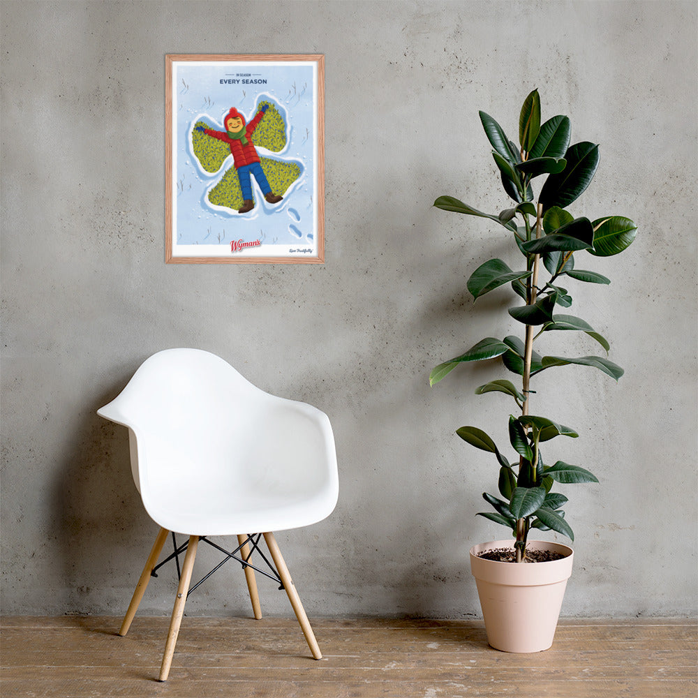 A chair next to a wall with a Shop Wyman's In Season, Every Season Poster featuring custom design printing finishes.