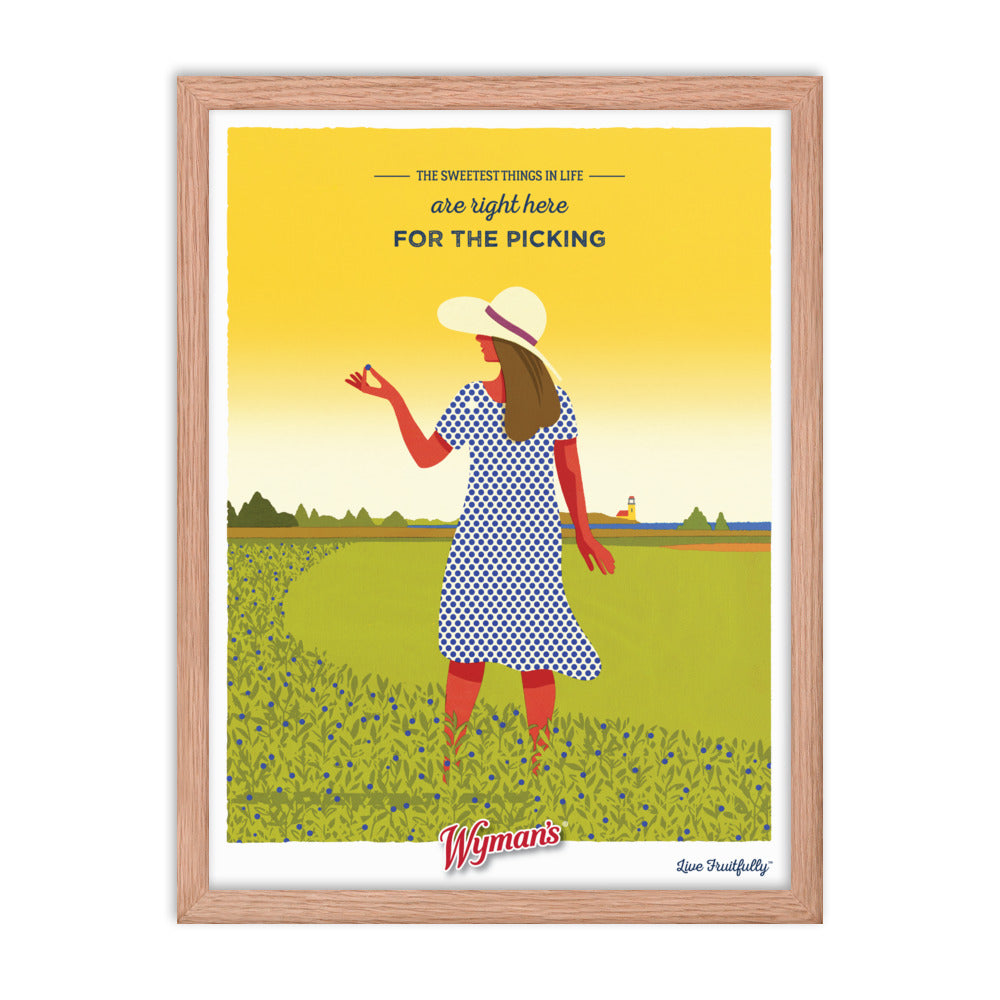A framed The Sweetest Things in Life are Right Here for the Picking Poster, showcasing a woman in a hat standing in a field by Shop Wyman's.