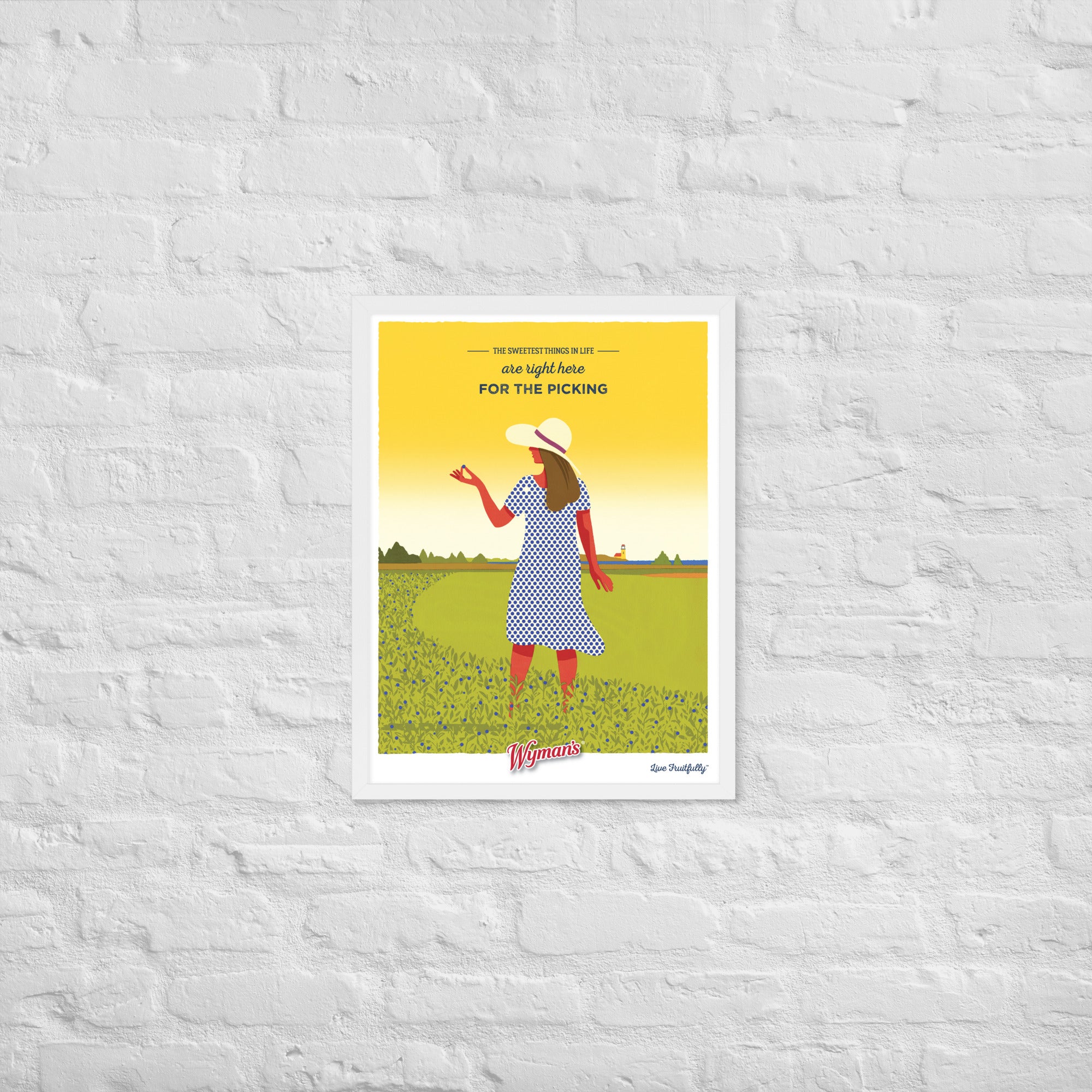 A Shop Wyman's "The Sweetest Things in Life are Right Here for the Picking" poster with a custom printing finish, featuring a woman in a hat in front of a brick wall.