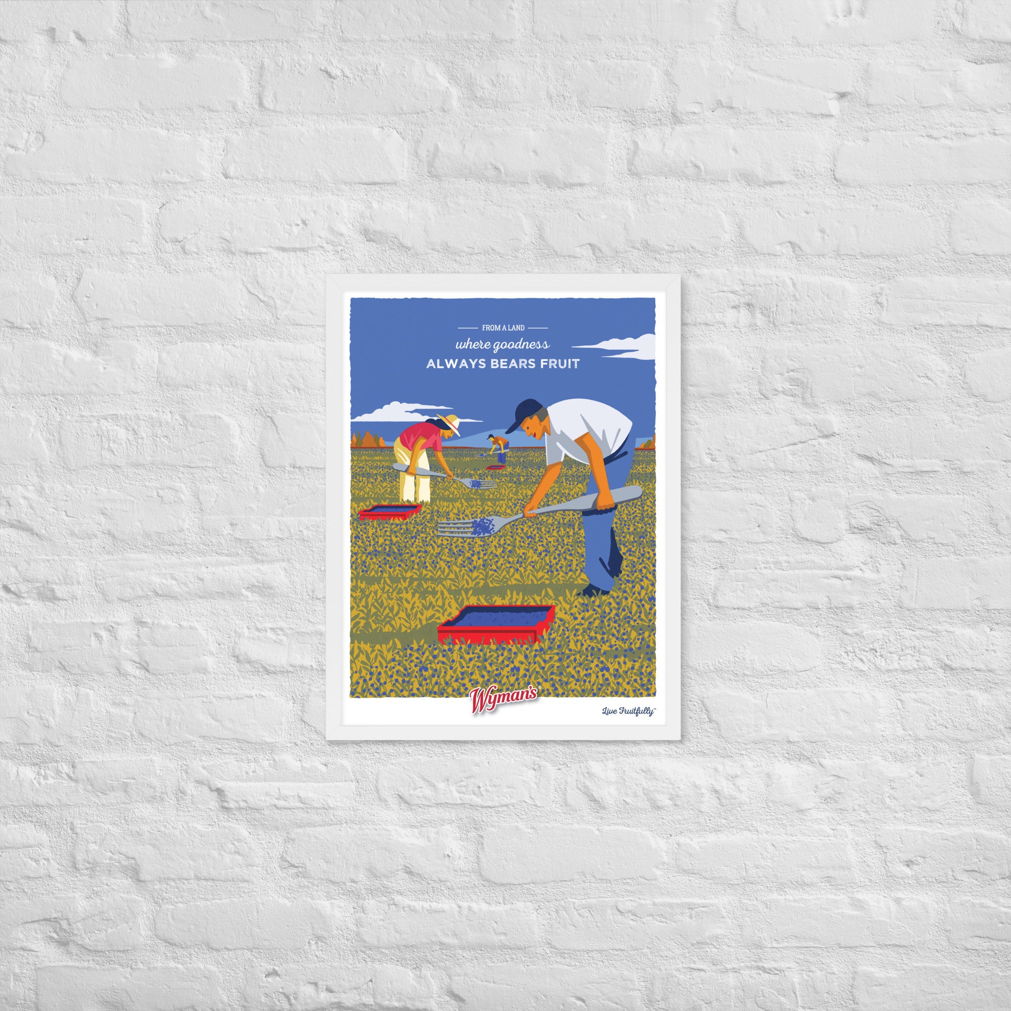 A brick wall with a printing of a From a Land Where Goodness Always Bears Fruit Poster by Shop Wyman's of a man in a field.