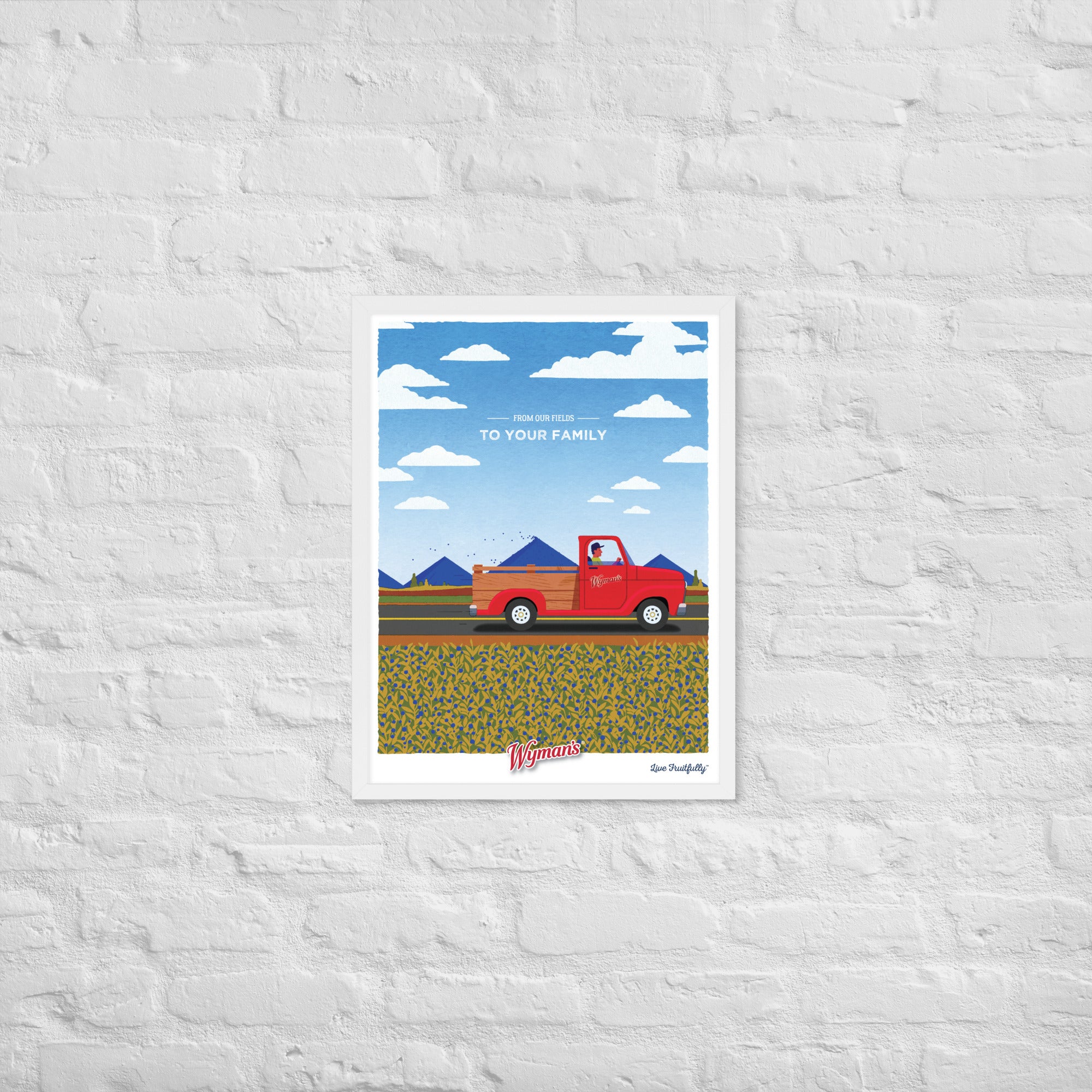 A From Our Fields to Your Family poster featuring a red truck printed on a brick wall design by Shop Wyman's.