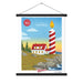 A custom 150 Years, This is Wild poster from Shop Wyman's with a lighthouse and a candle hanging on the wall.