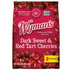 A bag of Wyman's Dark Sweet & Red Tart Cherries on a black background.