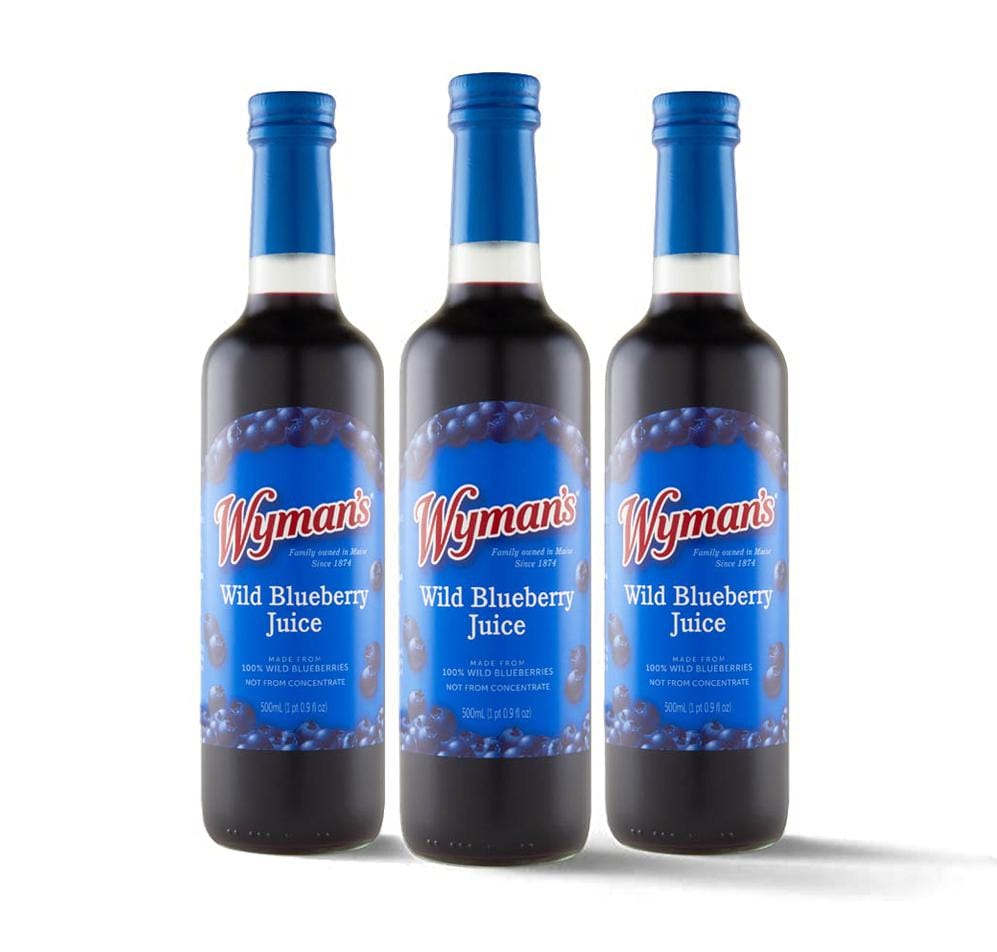 Three bottles of Wymans Wild Blueberry Juice on a white background