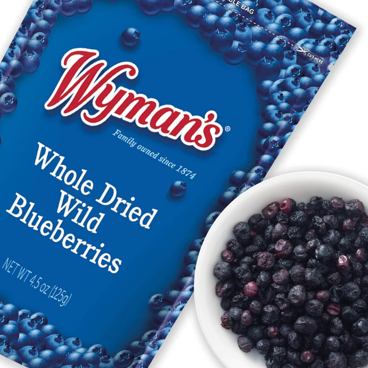 Wyman's Whole Dried Wild Blueberries package in blue with the Wyman's logo, shown alongside a white bowl filled with dried blueberries on a white background.