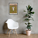 A chair next to a Shop Wyman's custom display of the In Concert with Nature Since 1874 Poster featuring a woman in a field.