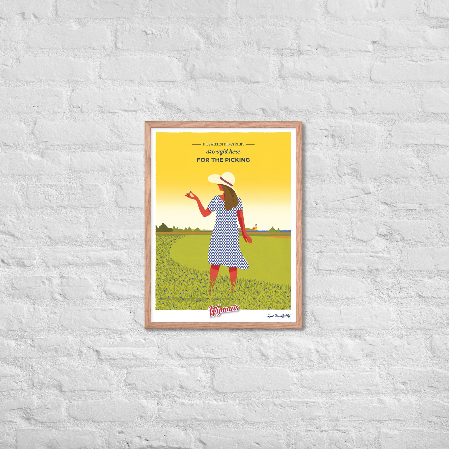 A Sweetest Things in Life are Right Here for the Picking poster, with custom printing finishes, features a woman in a hat standing in front of a brick wall by Shop Wyman's.