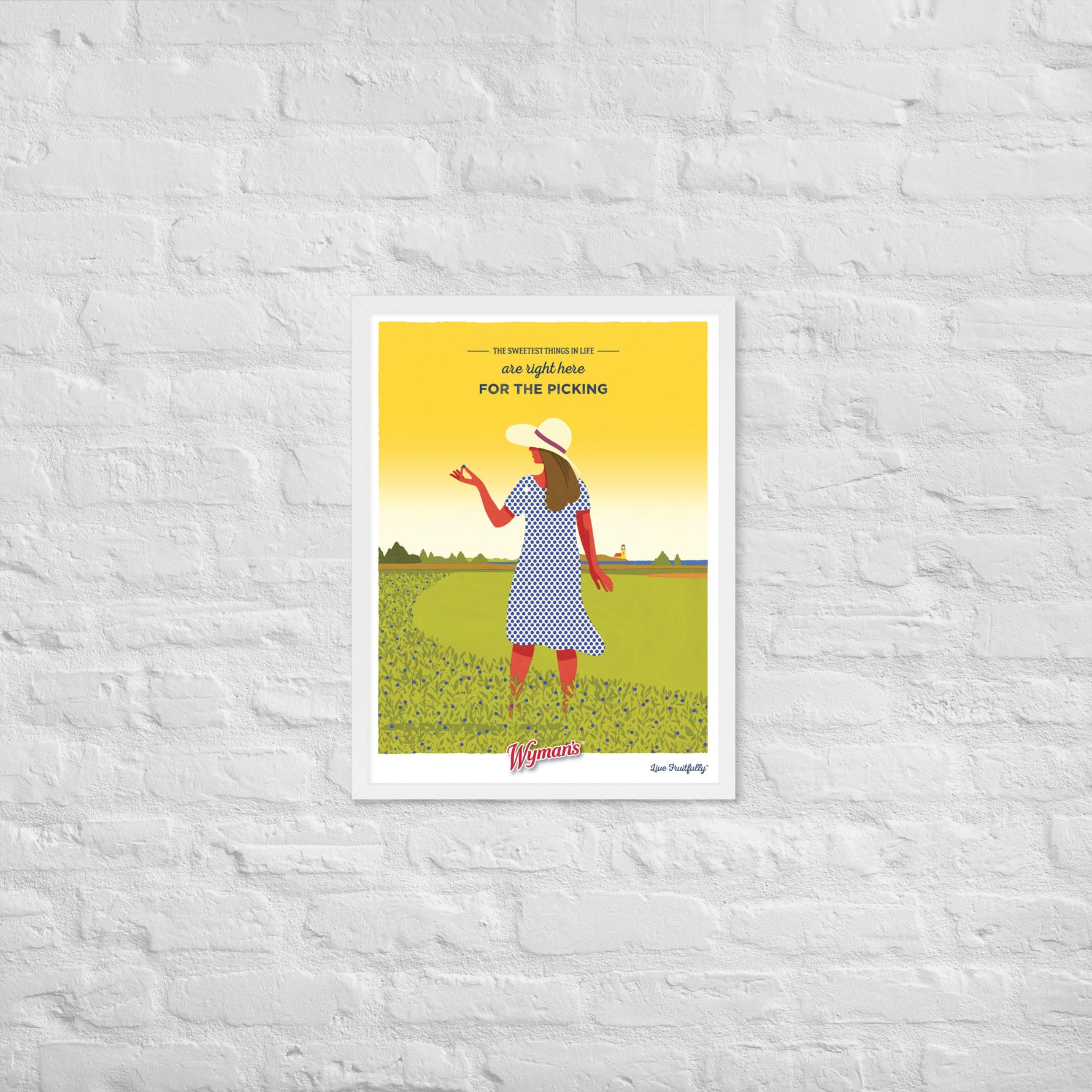 A Shop Wyman's "The Sweetest Things in Life are Right Here for the Picking" poster with a custom printing finish, featuring a woman in a hat in front of a brick wall.