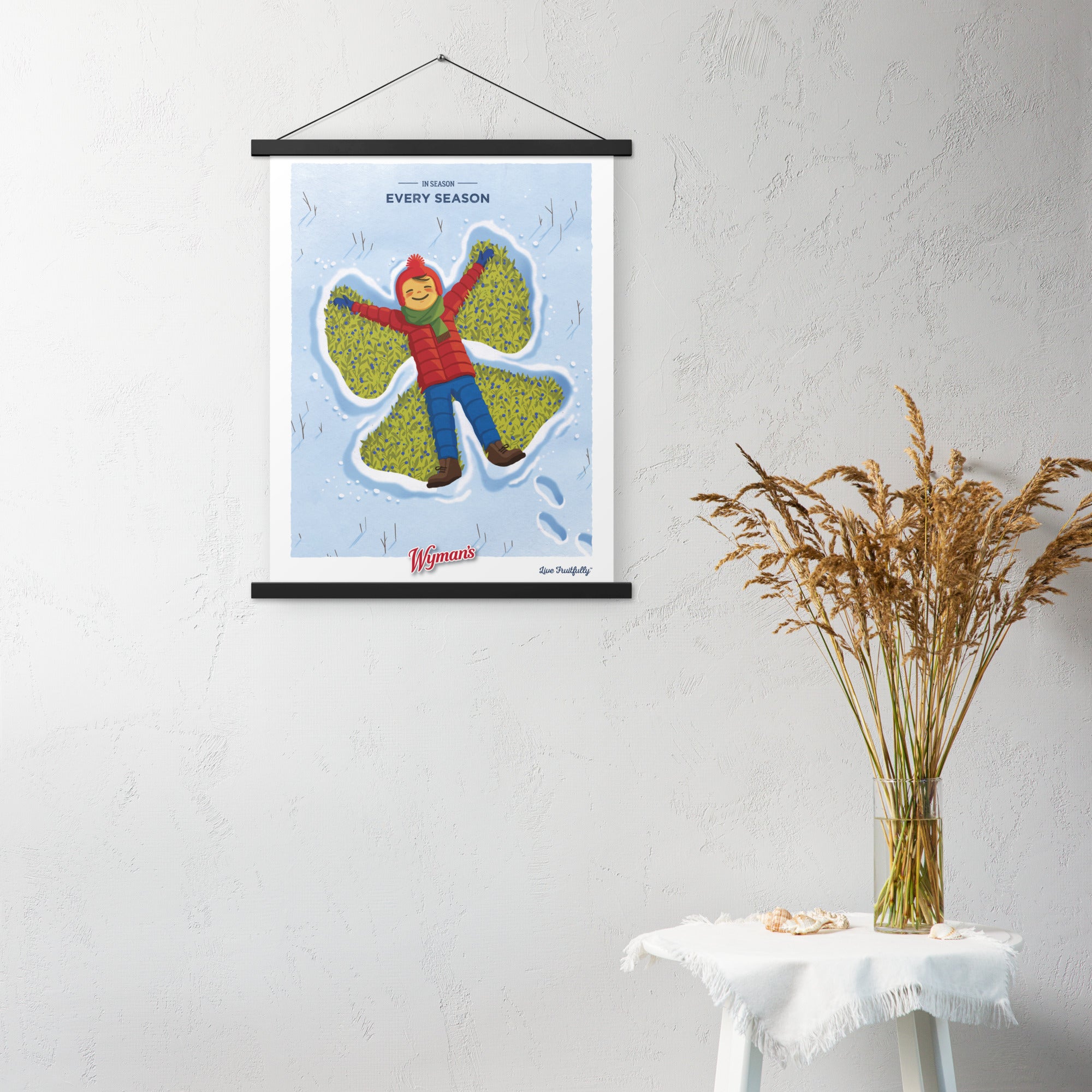 A Shop Wyman's In Season, Every Season Poster hanging on a wall with a picture of a bird.