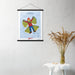 A Shop Wyman's In Season, Every Season Poster hanging on a wall with a picture of a bird.