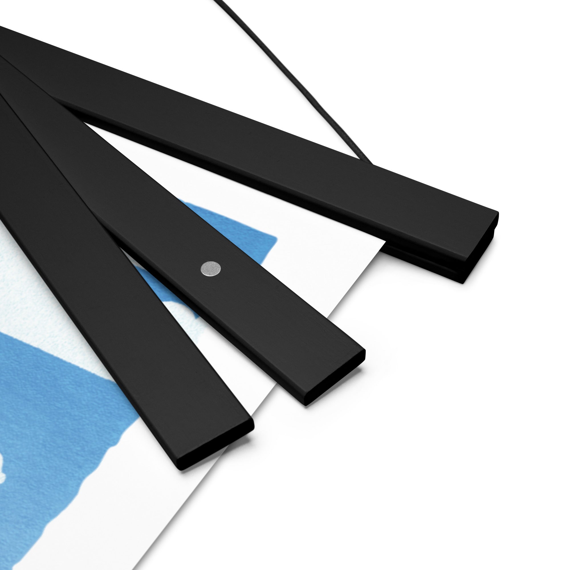 A black frame with a blue From Our Fields to Your Family Poster design on it from Shop Wyman's.