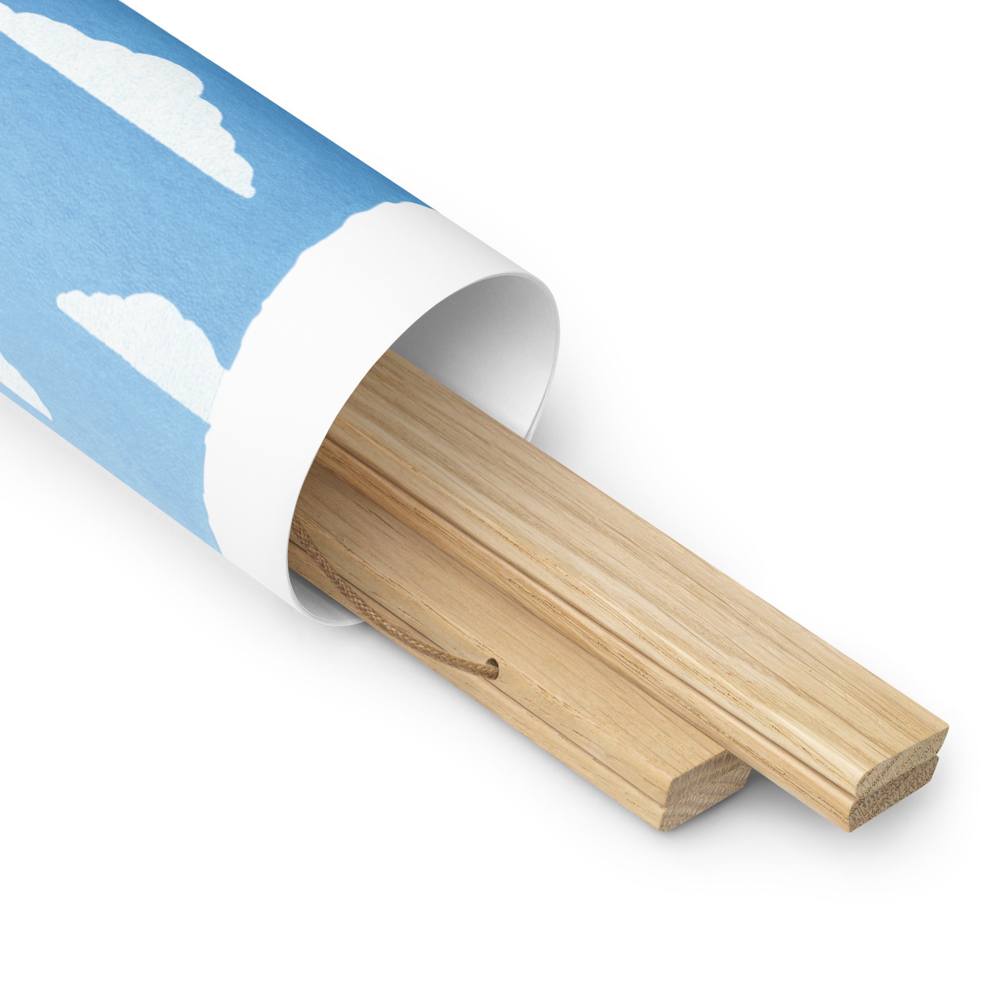 A roll of From Our Fields to Your Family Poster with a Shop Wyman's blue sky and clouds design on it.