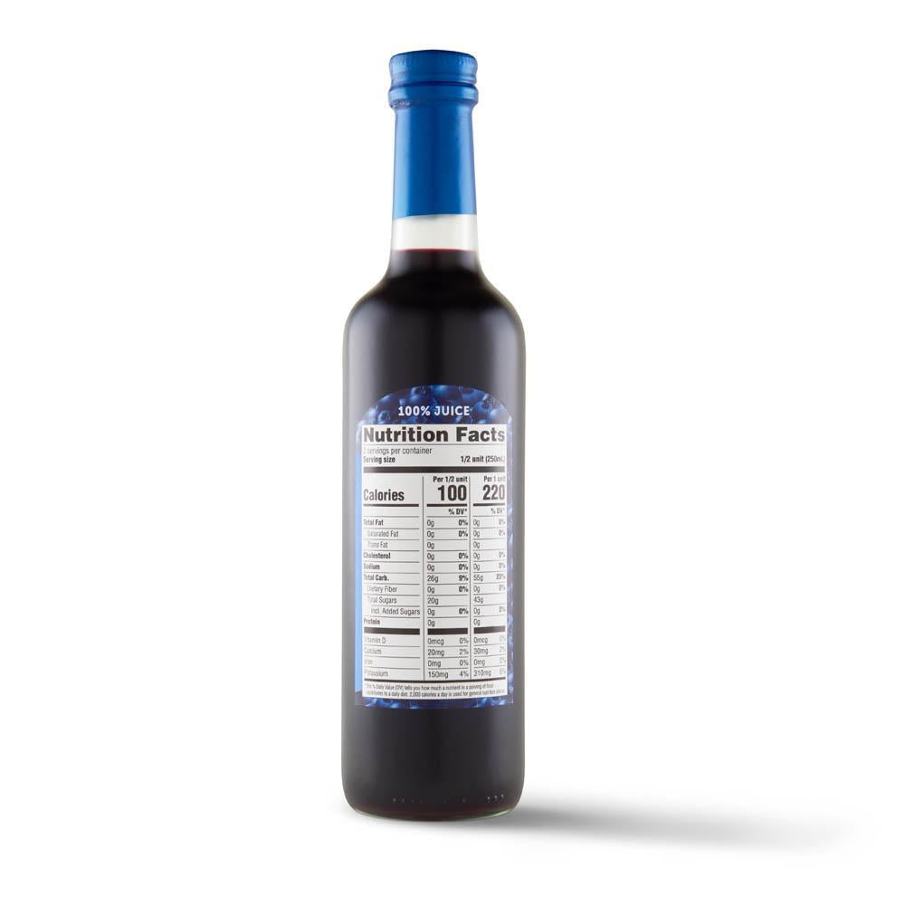 A tall glass bottle with a blue cap and front nutrition label, containing Whitneys Berry Best Bundle—a dark wild blueberry juice.