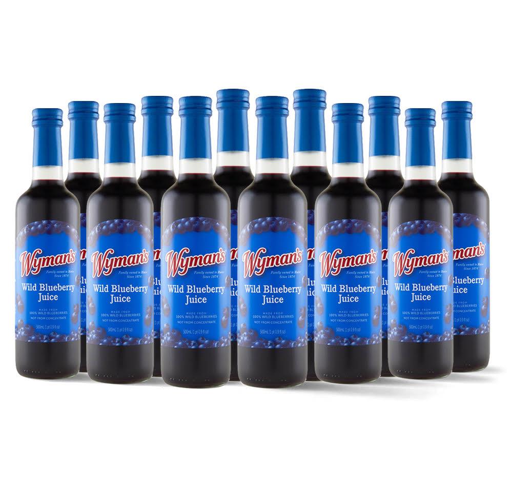A group of bottles of delicious Whitney Wild Blueberry Juice - 100% Juice syrup on a white background.