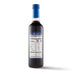 A bottle of delicious-tasting blueberry syrup made with Wild Blueberry juice and other ingredients, on a white background.