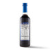 A bottle of Whitney's delicious-tasting blueberry syrup made with Wild Blueberry juice and other ingredients, on a white background.